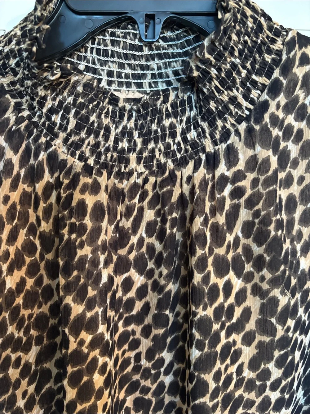 J Crew trendy animal print blouse with sheer sleeves and smocking at neckline